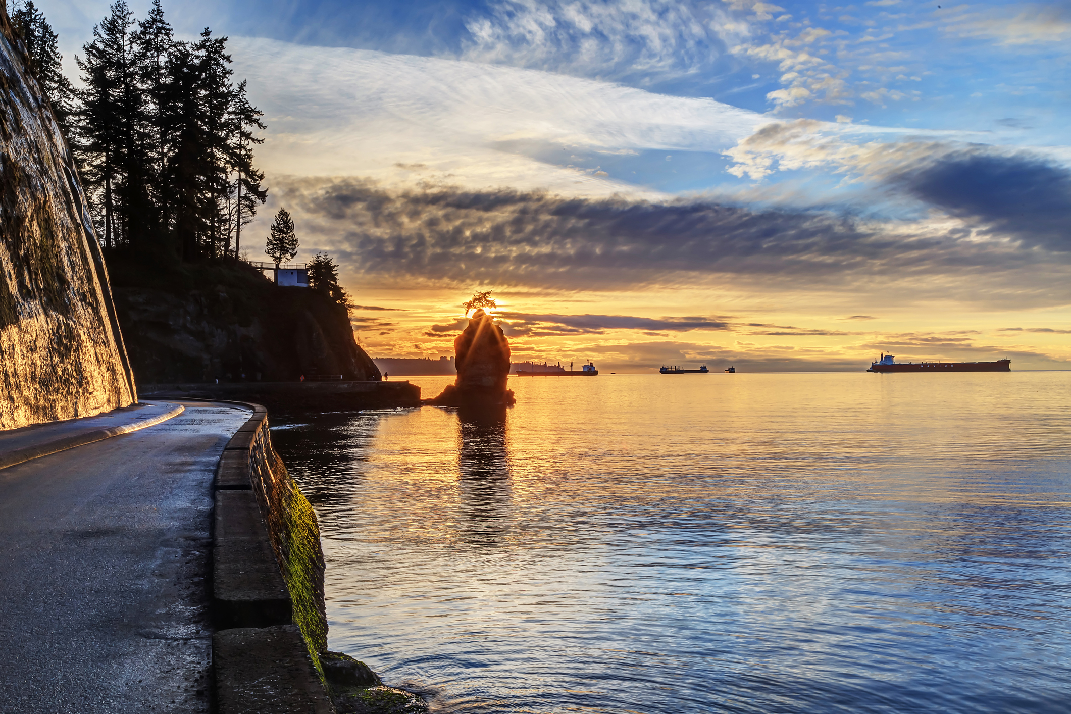 seawall and rock wall at sunset seawall and rock wall at sunset